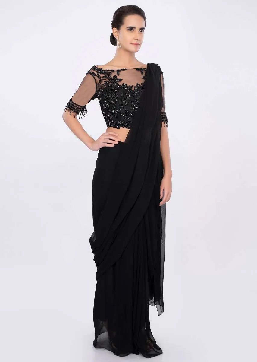 Black georgette draped saree with net embroidered blouse only on kalki