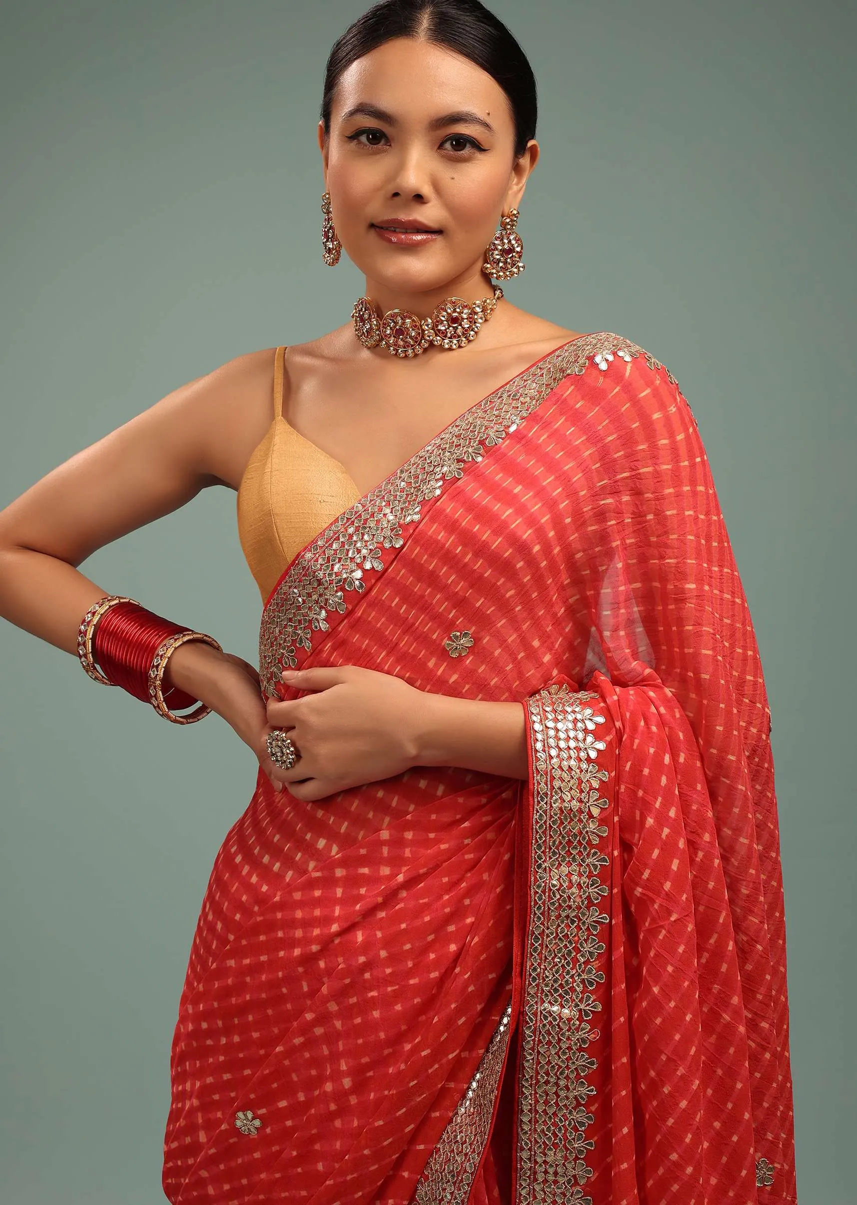 Fire Orange Leheriya Saree In Georgette With Gotta Work Border And Tassel Pallu