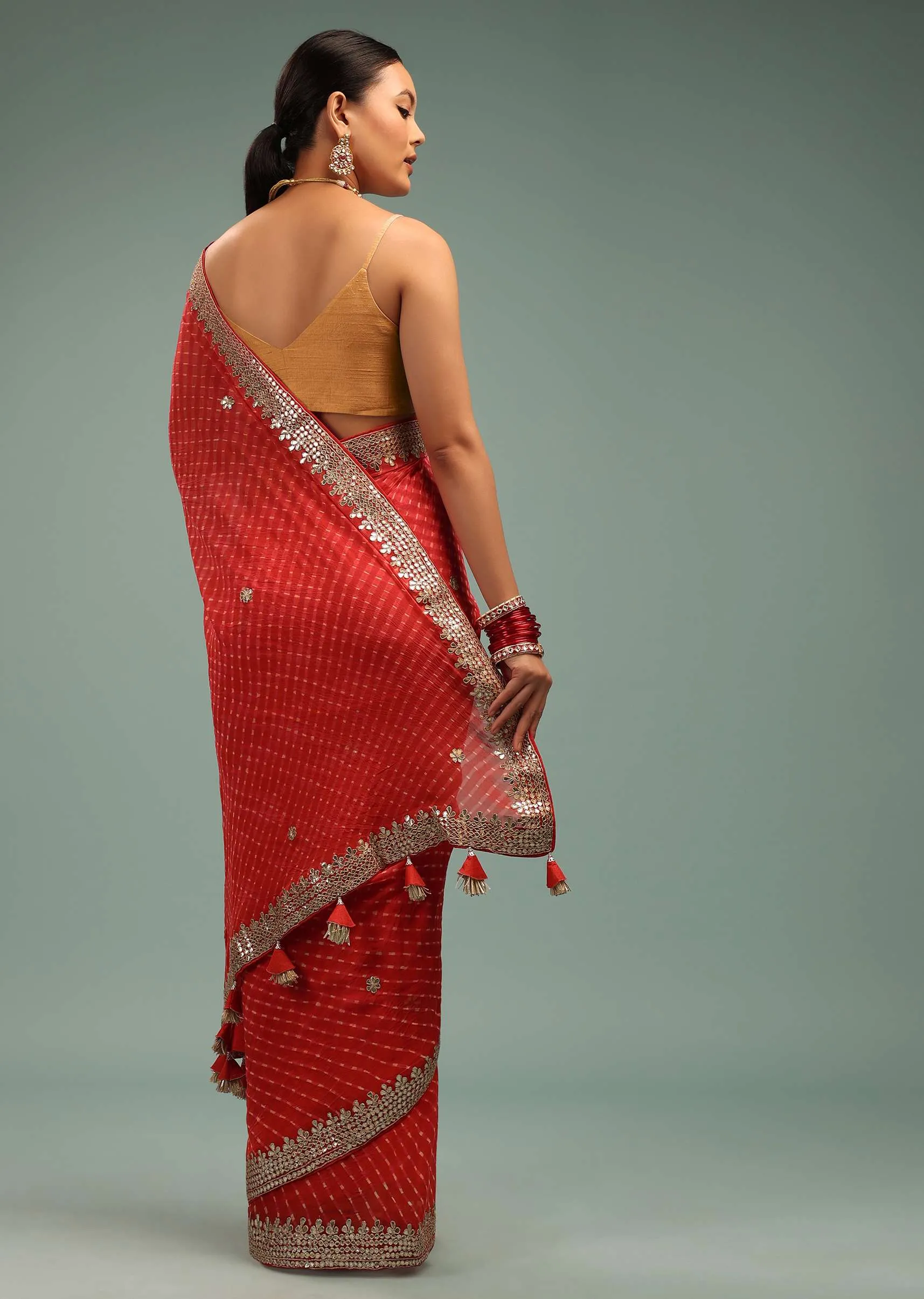 Fire Orange Leheriya Saree In Georgette With Gotta Work Border And Tassel Pallu