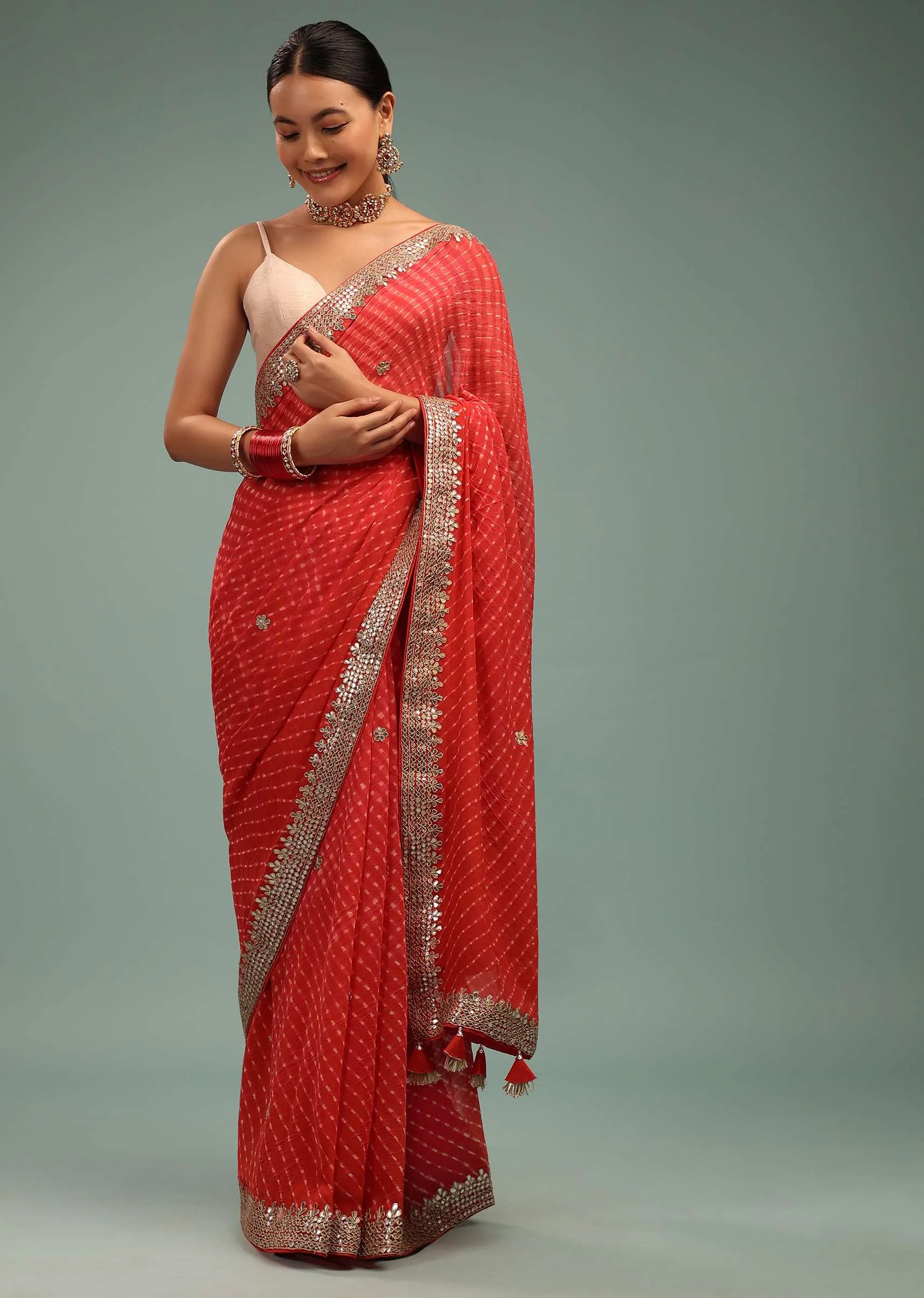 Fire Orange Leheriya Saree In Georgette With Gotta Work Border And Tassel Pallu