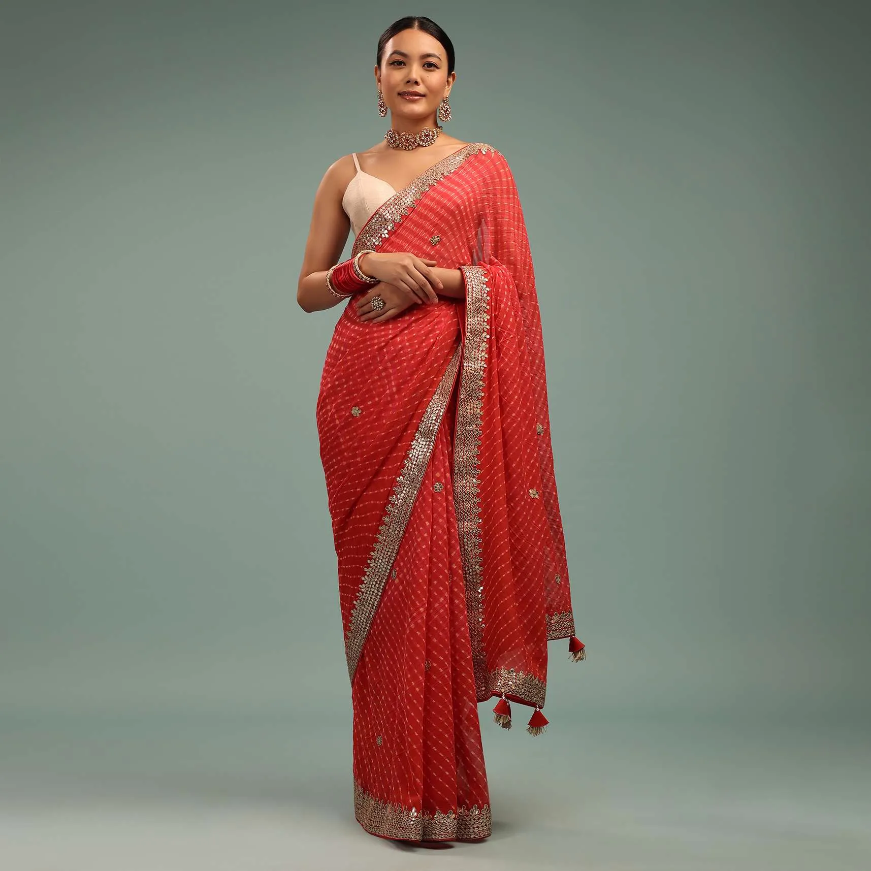 Fire Orange Leheriya Saree In Georgette With Gotta Work Border And Tassel Pallu