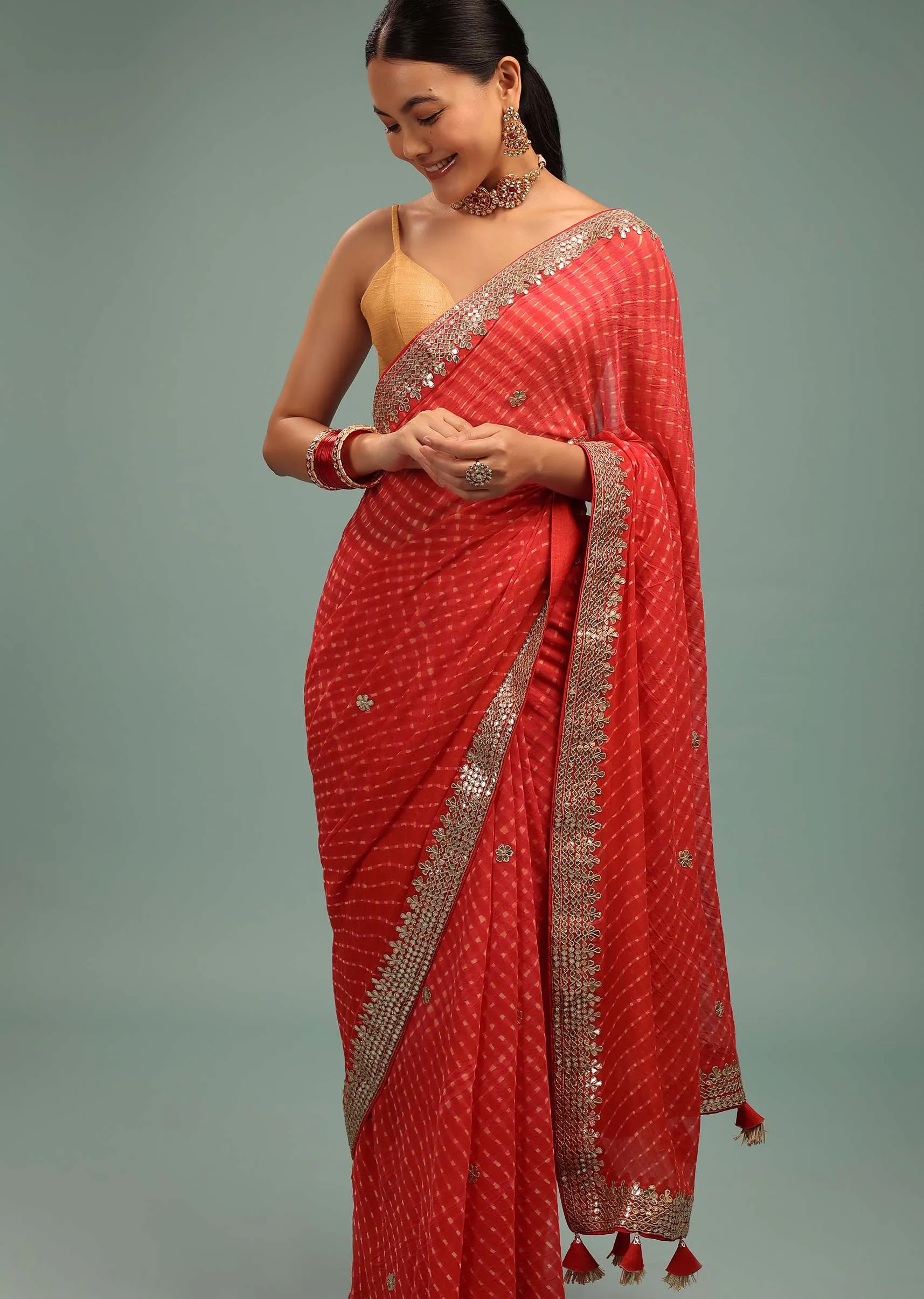 Fire Orange Leheriya Saree In Georgette With Gotta Work Border And Tassel Pallu