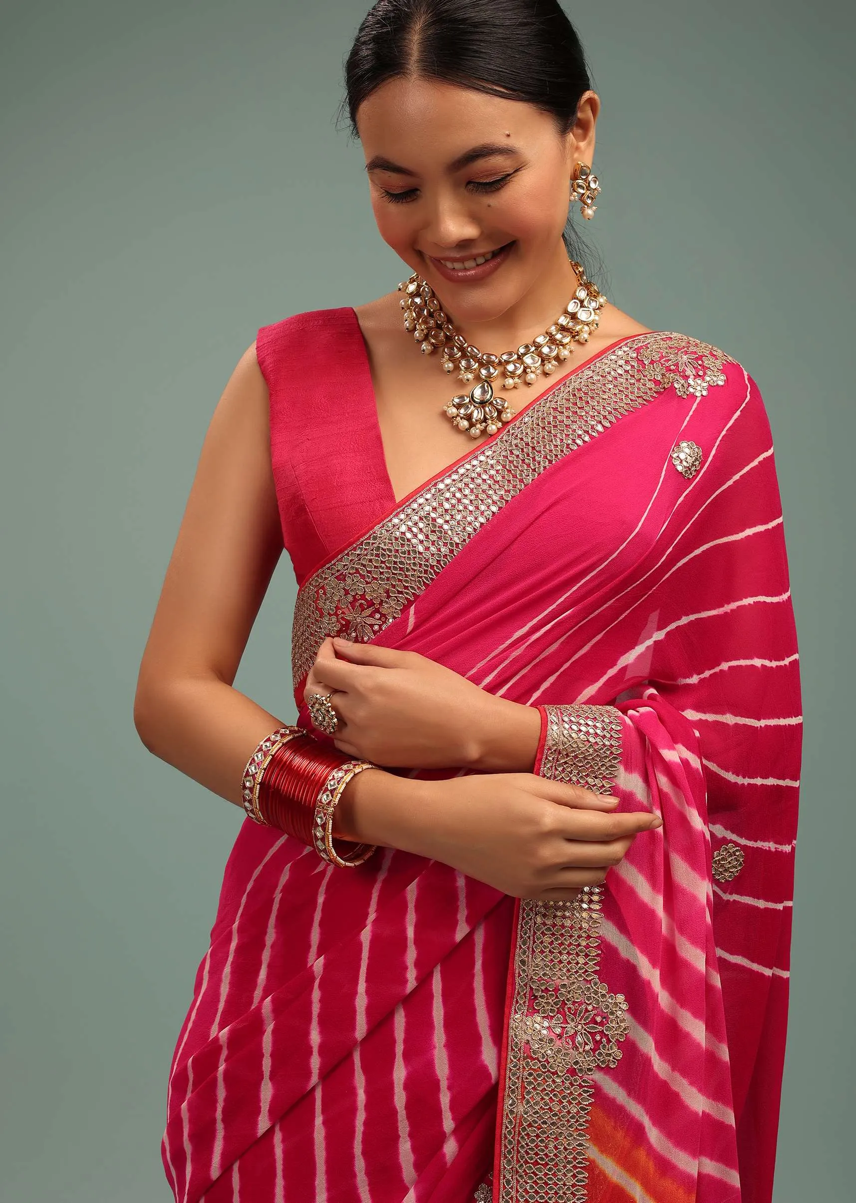 Gradient Red & Pink Leheriya Saree In Georgette With Jaipuri Gotta Work Border And Tassel Pallu