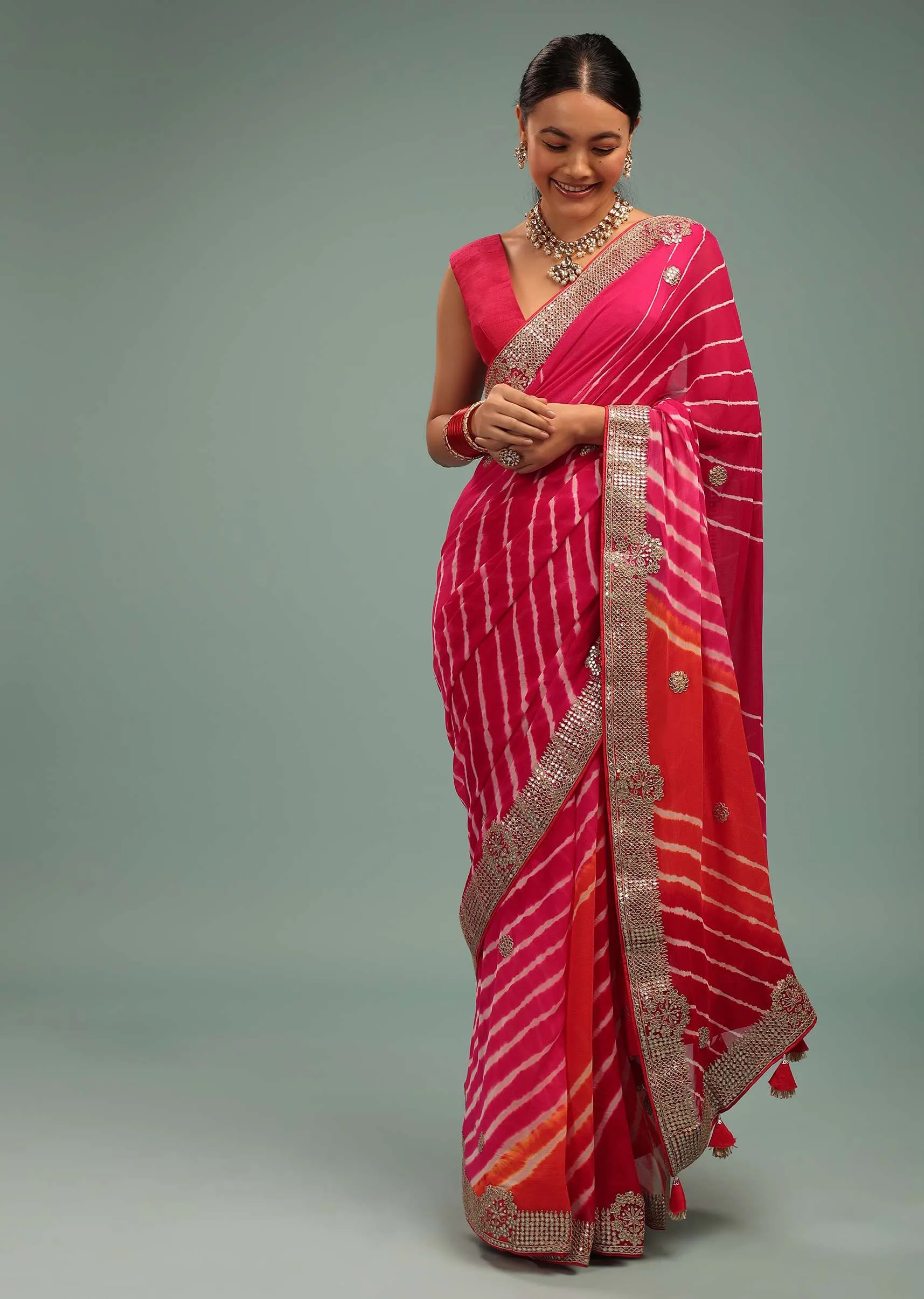 Gradient Red & Pink Leheriya Saree In Georgette With Jaipuri Gotta Work Border And Tassel Pallu